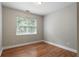 Cozy bedroom with beautiful hardwood floors and large window at 12 Isabella Ne Ct, Cartersville, GA 30121