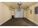 Spacious two-car garage featuring an automatic door and ample space for vehicles and storage at 12 Isabella Ne Ct, Cartersville, GA 30121