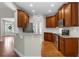 Stylish kitchen with stainless steel appliances and granite countertops, open to living area at 12 Isabella Ne Ct, Cartersville, GA 30121