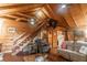 Comfortable living area featuring wood-paneled walls, cozy seating, and an open floor plan, perfect for relaxation at 218 Green Acre Ln, Cartersville, GA 30121
