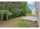View of backyard featuring a concrete patio and grass at 236 Arbor Creek Dr, Dallas, GA 30157