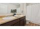 Bathroom featuring a double sink vanity with neutral colored countertops and a white shower curtain at 236 Arbor Creek Dr, Dallas, GA 30157