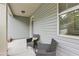 Cozy front porch with chairs and a view from the window at 236 Arbor Creek Dr, Dallas, GA 30157