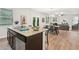 Spacious kitchen with granite countertops, stainless appliances, and open access to dining area at 236 Arbor Creek Dr, Dallas, GA 30157