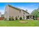Spacious backyard featuring a well-maintained lawn and mature landscaping at 3573 Willow Tree Trce, Decatur, GA 30034