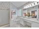 Bright bathroom with a dual sink vanity, bathtub, and a separate shower for a spa-like experience at 3573 Willow Tree Trce, Decatur, GA 30034