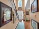 Foyer with hardwood floors, staircase, and elegant decor at 3573 Willow Tree Trce, Decatur, GA 30034