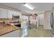 Bright kitchen with modern appliances, granite countertops, and a breakfast table at 3573 Willow Tree Trce, Decatur, GA 30034