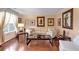 Cozy living room with natural light, hardwood floors, and a comfortable sofa at 3573 Willow Tree Trce, Decatur, GA 30034