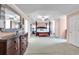Spacious main bedroom with tray ceiling, large windows, and access to ensuite bathroom at 3573 Willow Tree Trce, Decatur, GA 30034