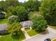 Aerial view of a home nestled among lush trees in a quiet neighborhood at 1060 Pinedale Se Dr, Smyrna, GA 30080