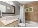 Bathroom with bathtub, shower, vanity, and mirror at 1060 Pinedale Se Dr, Smyrna, GA 30080