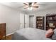 Bedroom with bed, dresser, bookcase, wood floors, and closet at 1060 Pinedale Se Dr, Smyrna, GA 30080