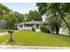 Charming home featuring a well-manicured lawn and curb appeal at 1060 Pinedale Se Dr, Smyrna, GA 30080