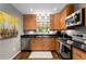 Well-lit kitchen with stainless steel appliances and stylish cabinetry at 1060 Pinedale Se Dr, Smyrna, GA 30080