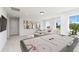 Spacious game room with an air hockey table and plenty of natural light at 1731 Jordan Brook Dr, Lawrenceville, GA 30043
