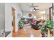 Bright, airy living room with high ceilings, beautiful fireplace, hardwood floors, and stylish decor at 2000 Kristian Way, Roswell, GA 30076