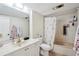 Functional bathroom with a bathtub, toilet, and sink for daily needs at 3530 Piedmont Ne Rd # 2I, Atlanta, GA 30305