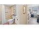 Hallway to a clean bathroom with a tub, and a bedroom, combining comfort and convenience at 3530 Piedmont Ne Rd # 2I, Atlanta, GA 30305