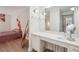 Bright bedroom featuring a built-in vanity with a mirror, enhancing functionality and style at 3530 Piedmont Ne Rd # 2I, Atlanta, GA 30305