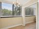 Dining area filled with light from large windows overlooking the outdoors at 3530 Piedmont Ne Rd # 2I, Atlanta, GA 30305