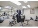 Well-equipped gym and fitness center with modern exercise machines and mirrored walls at 3530 Piedmont Ne Rd # 2I, Atlanta, GA 30305