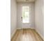 Bright entryway with a door with window and light wood-look flooring at 2856 Knob Creek Dr, Snellville, GA 30078