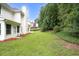 This home has a large, lush green backyard with a wooded area for privacy at 3932 E Saddle Ridge Dr, Lithonia, GA 30038