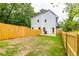 Spacious fenced backyard featuring well-maintained lawn and white exterior at 178 Wesley Ne Ave # A, Atlanta, GA 30307