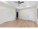 Large bedroom with hardwood floors, recessed lighting, and ensuite bathroom at 178 Wesley Ne Ave # A, Atlanta, GA 30307