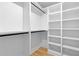 Large walk-in closet with built-in shelving offering ample storage space at 178 Wesley Ne Ave # A, Atlanta, GA 30307