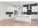 Well-lit kitchen with marble countertops, stainless steel appliances, and contemporary cabinetry at 178 Wesley Ne Ave # A, Atlanta, GA 30307