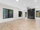 Open floor plan showcasing bright living room with fireplace, ceiling fan, and plenty of windows at 178 Wesley Ne Ave # A, Atlanta, GA 30307