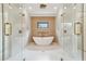 Modern bathroom features a freestanding tub and glass shower with dual shower heads at 2797 Benson Dr, Marietta, GA 30062