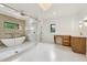 This spacious bathroom features a soaking tub, glass shower, and dual sink vanity at 2797 Benson Dr, Marietta, GA 30062
