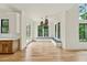 Bright dining area with hardwood floors, large windows, and stylish pendant lighting at 2797 Benson Dr, Marietta, GA 30062