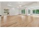 Expansive main bedroom with hardwood flooring, recessed lighting, and a view of the ensuite bath at 2797 Benson Dr, Marietta, GA 30062