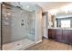 Modern bathroom featuring a glass-enclosed shower with gray tile and a double vanity at 2956 Silver Hill Se Ter, Atlanta, GA 30316