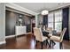 Elegant dining room with dark wood floors, modern lighting, and stylish decor at 2956 Silver Hill Se Ter, Atlanta, GA 30316