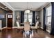 Elegant dining room with dark wood floors, modern lighting, and stylish decor at 2956 Silver Hill Se Ter, Atlanta, GA 30316