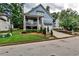 Charming two-story blue home with a welcoming front porch and manicured landscaping at 2956 Silver Hill Se Ter, Atlanta, GA 30316