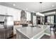 Modern kitchen boasts a large island, stainless steel appliances, and stylish backsplash at 2956 Silver Hill Se Ter, Atlanta, GA 30316
