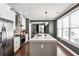Modern kitchen with stainless steel appliances, a large island, and sleek countertops at 2956 Silver Hill Se Ter, Atlanta, GA 30316