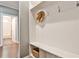 Charming mudroom entry with built-in shelving and coat hooks and view of adjacent bathroom at 2956 Silver Hill Se Ter, Atlanta, GA 30316