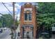 Mixed-use neighborhood retail with outdoor patios, a brick building, and convenient parking at 2956 Silver Hill Se Ter, Atlanta, GA 30316