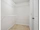 Walk-in closet with wire shelving, ready to be organized with your personal items at 3143 Bonnes Dr, Stonecrest, GA 30038