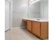 Bathroom features ample storage space, neutral tiling and lots of counterspace at 541 Shadow Valley Ct, Lithonia, GA 30058