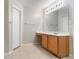Bright bathroom with ample counterspace, lots of natural light, and neutral tones at 541 Shadow Valley Ct, Lithonia, GA 30058