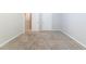 A spacious bedroom with neutral walls, carpeted floor and two closets at 541 Shadow Valley Ct, Lithonia, GA 30058