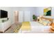 Staged bedroom featuring modern decor, neutral colors, and a comfortable bed at 541 Shadow Valley Ct, Lithonia, GA 30058